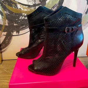 Gently worn, black Schutz ankle booties